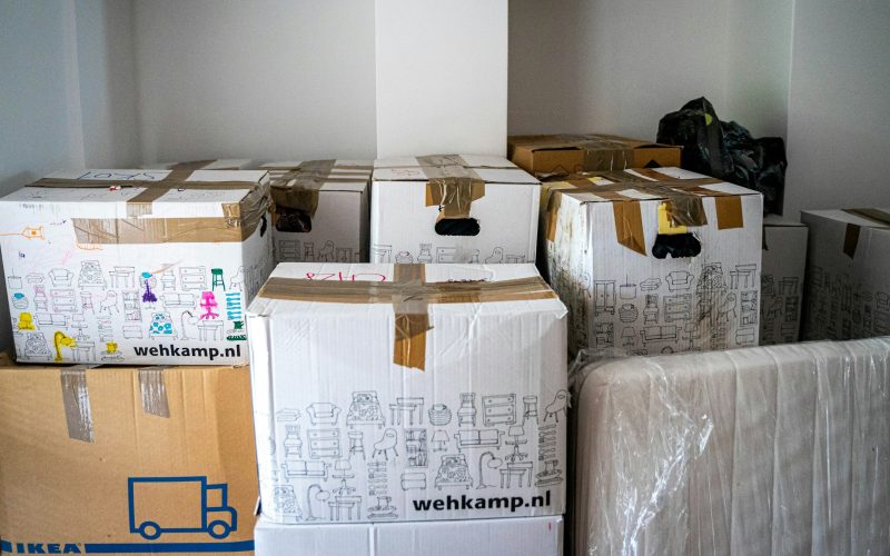 Moving boxes stacked in a room