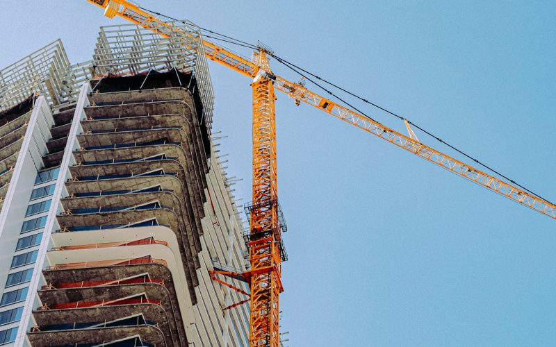 Tower crane beside a condo tower under construction